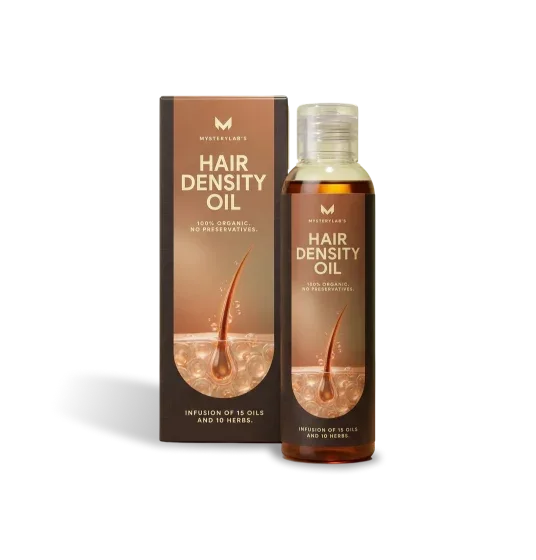 Couple with healthy hair holding MysteryLab Hair Density Oil